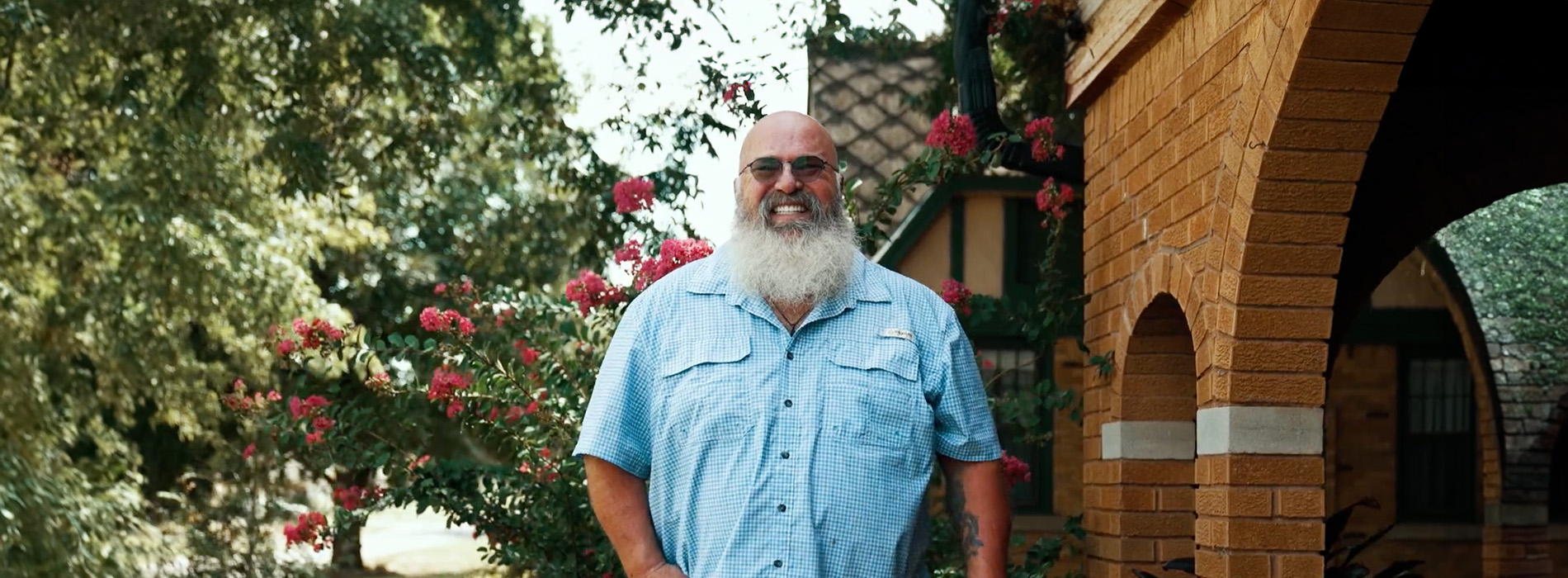 The image shows a hand holding a tablet with a star rating graphic on the screen, indicating high customer satisfaction or approval.