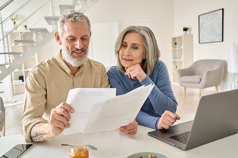 patients calculating the cost of dental implants
